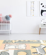 Детский ковер Tarkett Sunny Kids 33ZNZ с рисунками животных в интерьере светлой детской комнаты