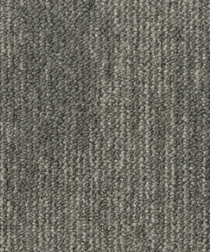kovrovaia-plashka-desso-essence-essence-aa92-9504 Крупный план лицевой поверхности ковровой плитки Desso Essence AA92 9504 серого цвета.