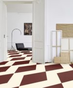 Пример виниловой плитки Tarkett iD Mixonomi Tessitura Burgundy в интерьере гостиной.