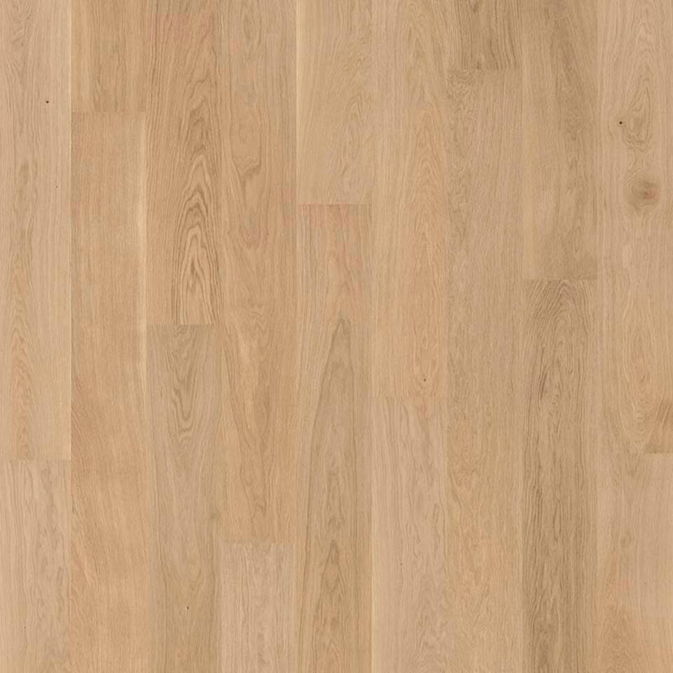 Крупный план вертикальной раскладки однополосной паркетной доски Tarkett Shade из светлого натурального дуба.