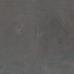 Крупный план виниловой плитки Tarkett Metal Plate с матовой текстурой под металл.