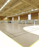 Пример укладки износостойкого спортивного линолеума Tarkett Concrete Grey Beige в универсальном крытом зале