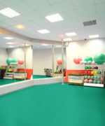 Пример укладки спортивного линолеума Tarkett Omnisports Action 40 Field Green в фитнес-зале