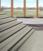Пример отделки лестничного марша акустическим линолеумом Tarkett Tapiflex Stairs Concrete Stairs Cool Grey