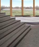 Пример облицовки лестничного марша акустическим линолеумом Tarkett Tapiflex Stairs Concrete Stairs Dark Grey
