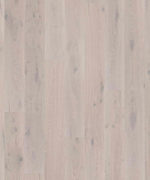 Крупный план текстуры однополосной паркетной доски Tarkett Heritage Oak Urban Grey.