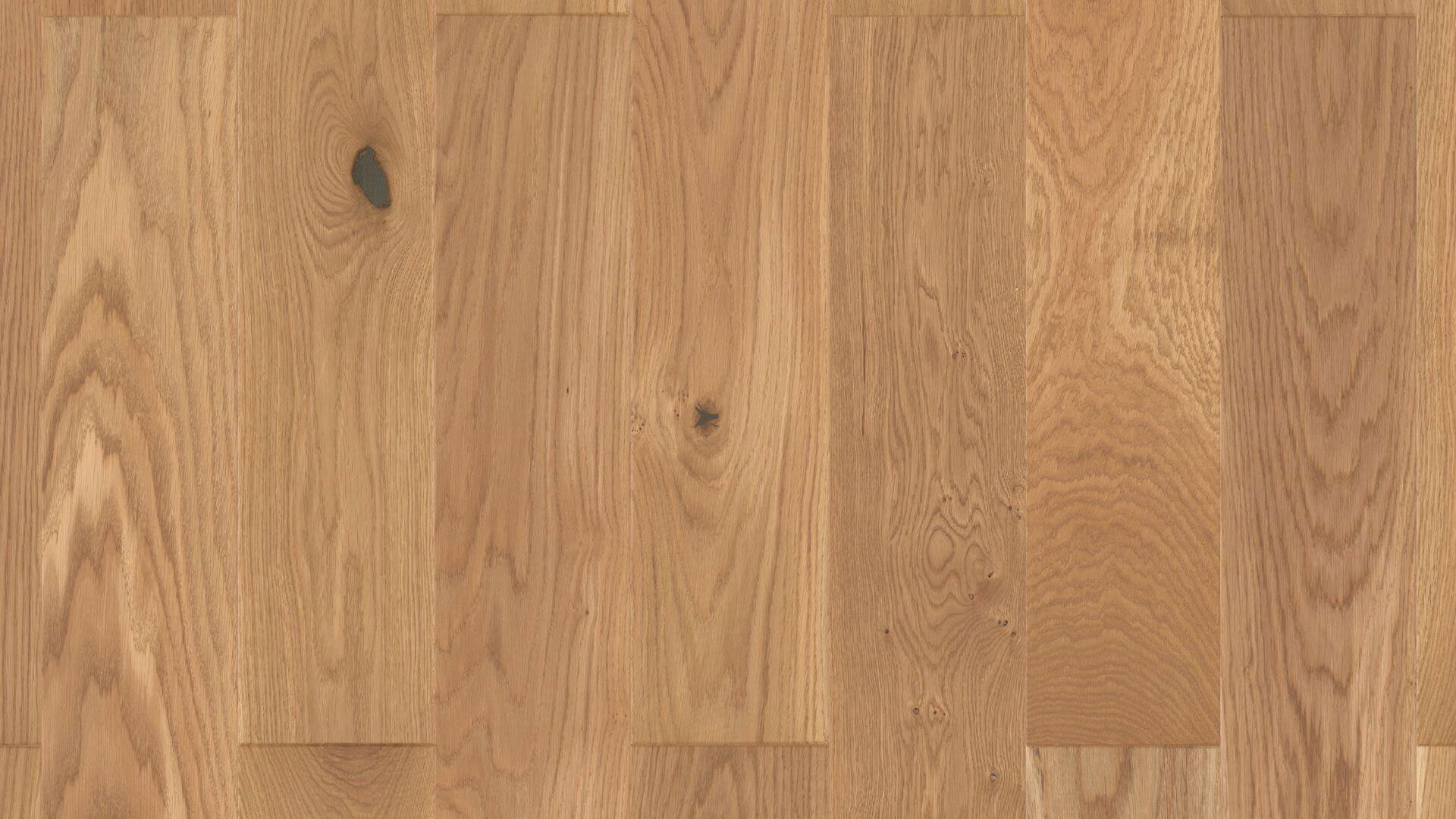 Паркетная доска Tarkett Bolero Plank Oak Viejo однополосная, крупный план текстуры натурального дуба с выразительными темными сучками.