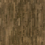 Макрофотография плашек Tarkett Timber Ash Earthquake подробно передает глубокую темную текстуру и выразительный природный рисунок ясеня.