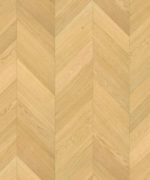 Близкий ракурс паркета французской елочкой Tarkett Privilege Galoni Oak White демонстрирует мягкую текстуру дуба в утонченном белом оттенке.