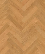 Близкий ракурс паркета французской елочкой Tarkett Privilege Prestige Oak Antique наглядно раскрывает живую текстуру дуба в медовых тонах.