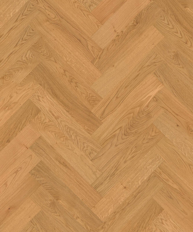 Близкий ракурс паркета французской елочкой Tarkett Privilege Prestige Oak Antique наглядно раскрывает живую текстуру дуба в медовых тонах.