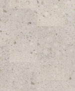SPC-плитка Tarkett Element Click Toffee Glaze бежевого оттенка. Текстура напольного покрытия с имитацией конгломерата или камня крупным планом.