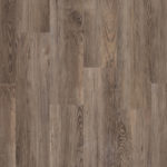 SPC-ламинат Tarkett Prime Click Clay Brown глубокого коричневого оттенка. Текстура напольного покрытия с выраженным рисунком состаренного дерева.