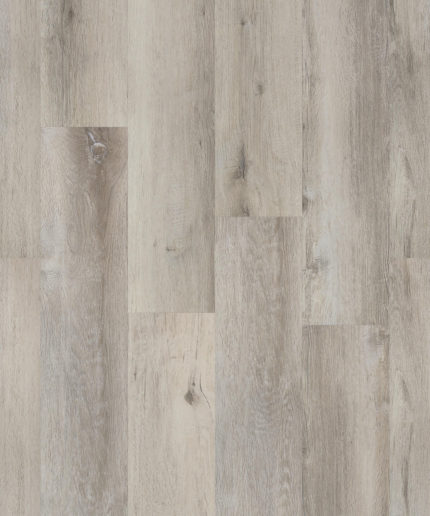 SPC-ламинат Tarkett Prime Click Mountain Grey холодного серого оттенка. Текстура напольного покрытия с мягким рисунком дерева крупным планом.
